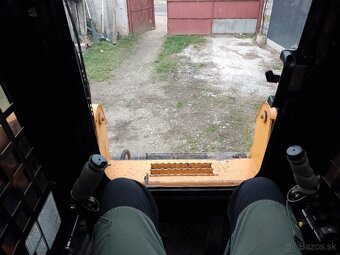 Šmykom riadený nakladač Racoon HT 60 - 8