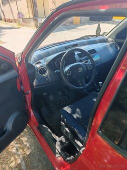 Suzuki Swift 1.3i - 8
