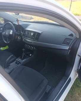 Mitsubishi Lancer,1.6 mivec benzín,2015 - 8