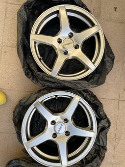 Dezent TY 7Jx16 4x108 stred 67 - 8