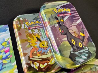 Prismatic Evolutions - 8x Mini Tins + 8x Mince + 8x Art - 8
