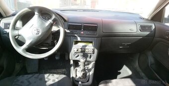 Volkswagen Golf IV 1,4i 16V 55KW kód:AHW - 8