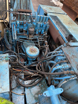 Kolový nakladač FUCHS 714.4 ELEKTROMAGNET - - 8