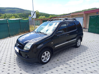 Suzuki Ignis 1,3 16v VVT 69kw benzín ABS A/C Premium - 8