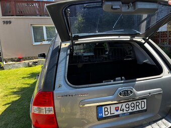 Sportage 2,0i ,4x4 - 8