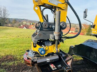 Kolesové rypadlo Caterpillar M316F - 8