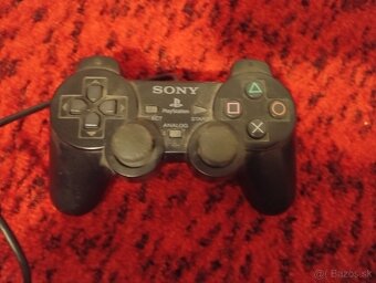 PLAYSTATION 2 SLIM - 8