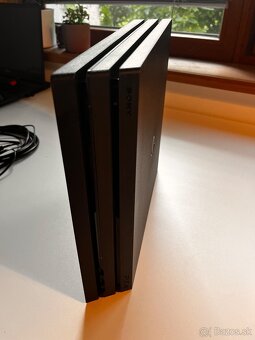 Ps4 Pro (1T) + kontroler + 2x hra + kablova suprava - 8