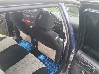Golf 4 1,6 74kw - 8