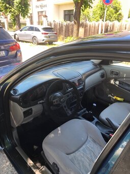 Nissan Almera n16 2002 1.5 66kw - 8