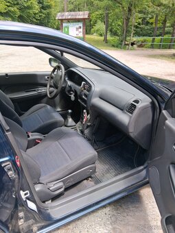 Mazda 323 - 8
