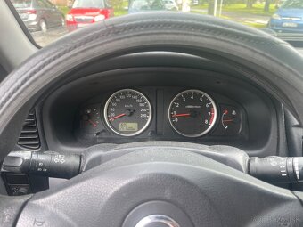 Nissan almera - 8