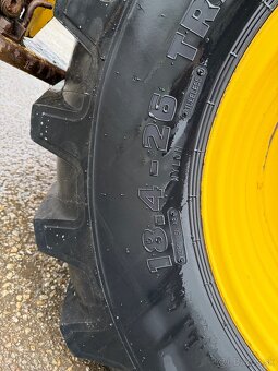 NEW HOLLAND traktor báger 2006 VIN 028 - 8