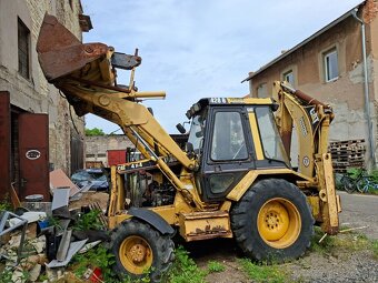 CATERPILLAR 428B 4X4 - 8
