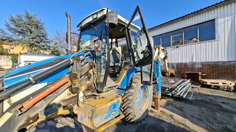 CATERPILLAR 428 C 4X4 - 8