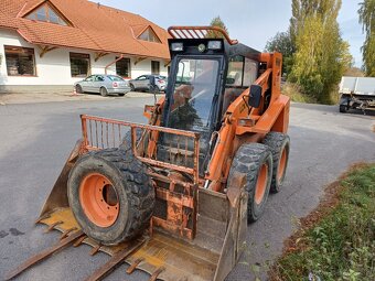 Locust L 1203 smykový nakladač - 8