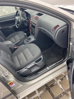 Škoda octavia 2 , 1.6 benzín 75 kw,2011 - 8