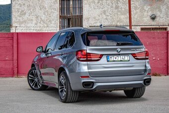 BMW X5 M50d  A/T - 8