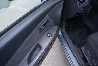 Kia Rio 1.4i - 8