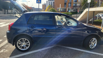 Toyota Corolla E12J rok 2004 - 8