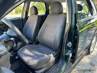 Opel Corsa 1.2 16V Twinport Cosmo Sport - 8