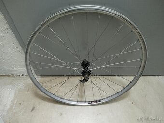 {19}  Zapletené kolesá 26" - 8