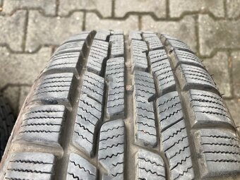 Predám sadu zimných kolies s puklicami na Ford Fiesta R14 - 8