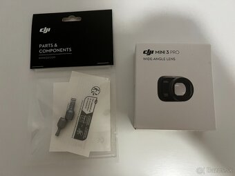 Dron DJI Mini 3 PRO (DJI RC) + Fly More KIT - 8