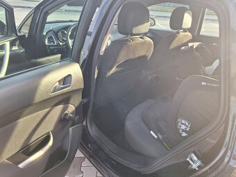 Opel astra J combi - 8