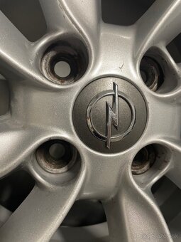 4x100 R15 6J ET39 Opel Corsa + 185/65 R15 Continental - 8