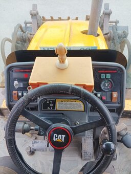 Traktorbager Caterpillar 428 - 8