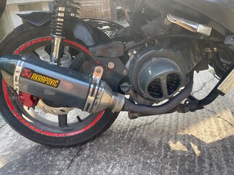 Adamoto 125 - 8