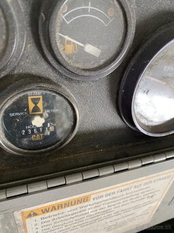 CAT 438B - 8