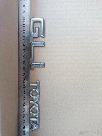 Toyota  Carina e emblemy / znaky na karoseriu - 8