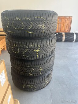 Disky so zimnými a letnými pneumatikami na Teslu Y - 8