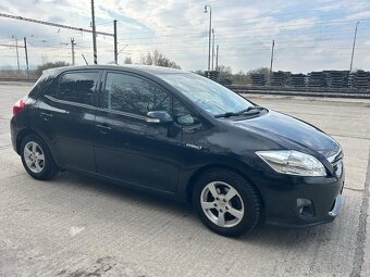 Auris Hybrid 1,8 - 8