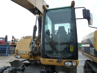 CATERPILLAR M313D - kolové rýpadlo - 8