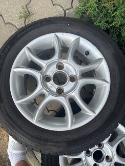 Pneumatiky s diskamy R14 - 8