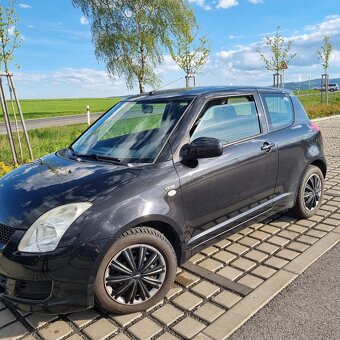Suzuki Swift 1.3 ddis - 8