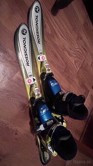 REZERVOVANÉ Detské lyže, 80cm, lyžiarky 17,5 a prilba - 8