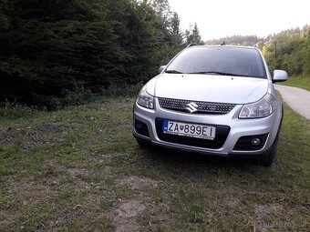 Suzuki SX4 1,6 benzín 88kw 4x4 r.2010 - 8