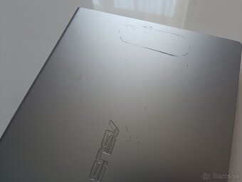 Asus M409B - 8