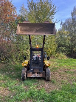 Šmykový nakladač UNC 060 - 8