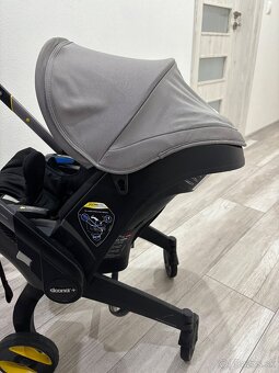 Autosedačka Doona+ s integrovaným podvozkom, isofixom - 8