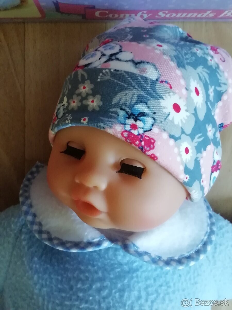 Realisticka babika s oblecenim - 9