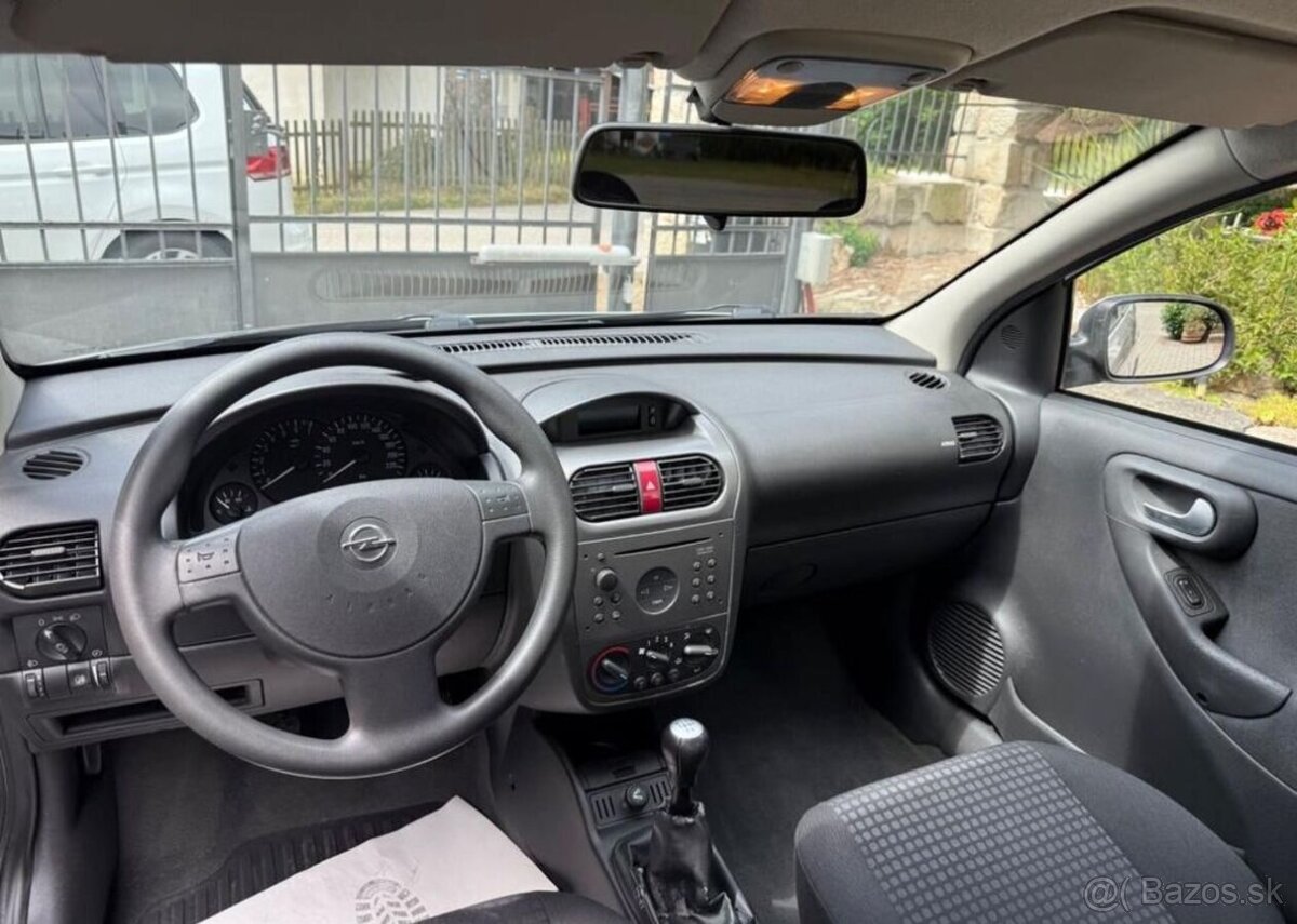 Opel Corsa 1,2 i klima , 2 sady kol benzín manuál 55 kw - 9