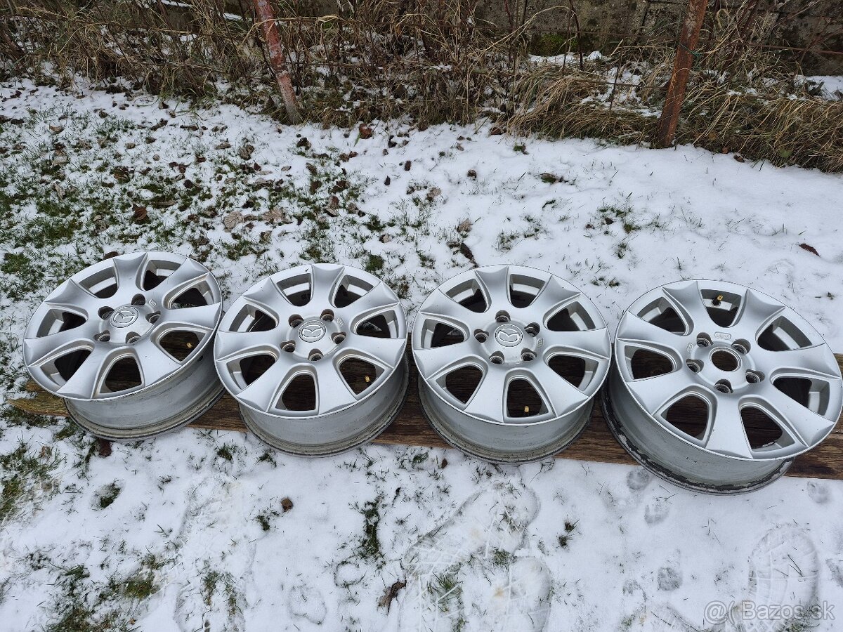 Al disky mazda 15" - 9