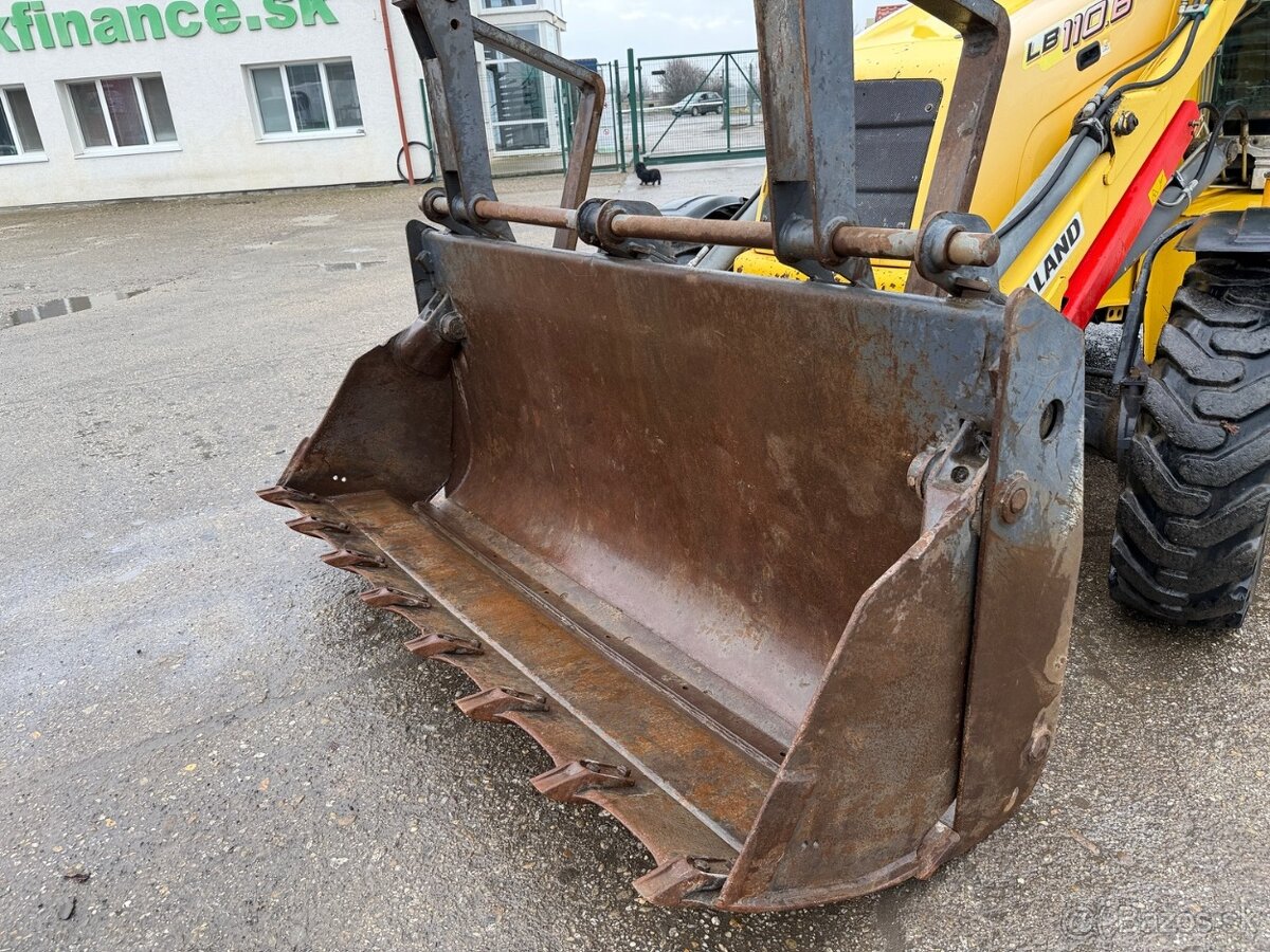 NEW HOLLAND traktor báger 2006 VIN 028 - 9