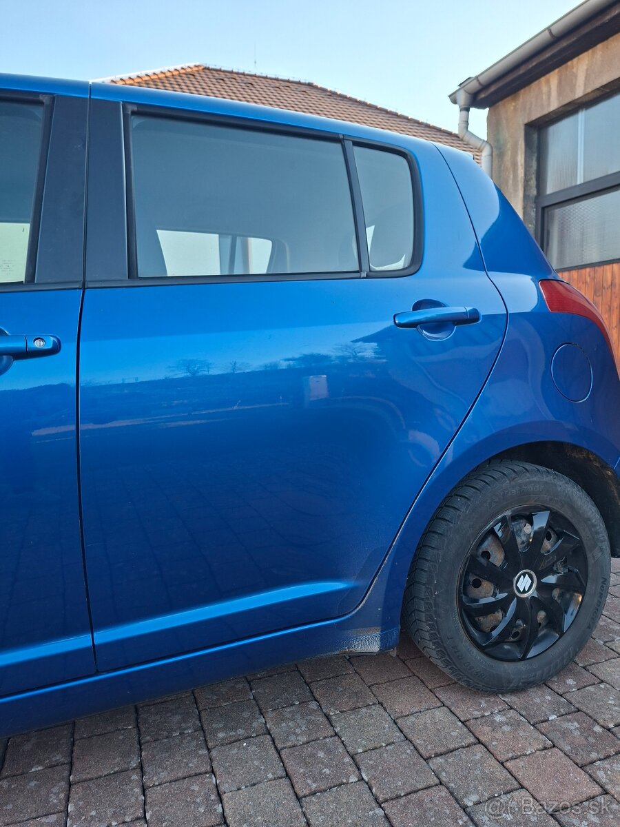 Suzuki Swift 1.3 - 9