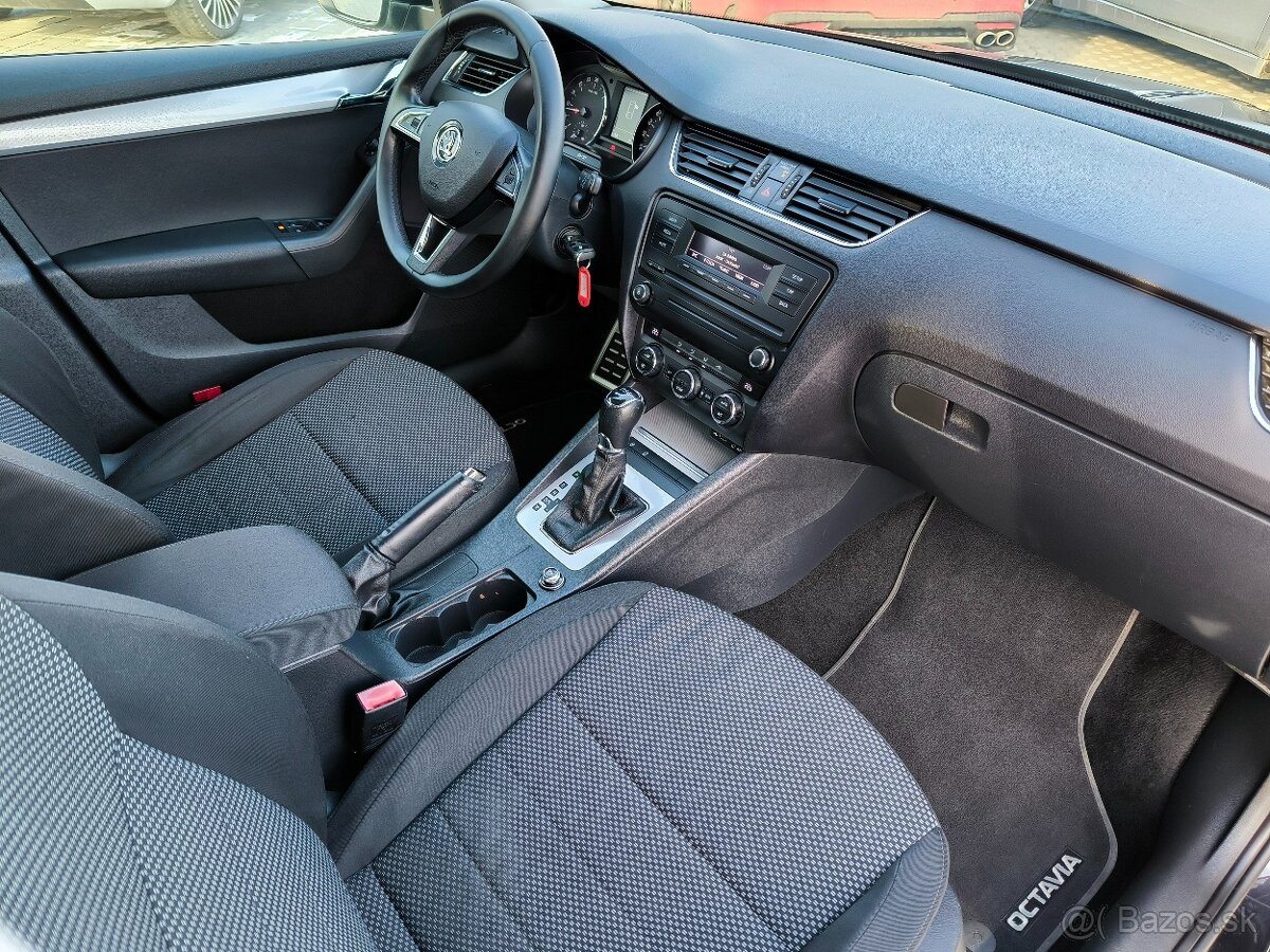 Škoda Octavia Combi 1.6TDI - DSG - 2014 - Ambition - 9